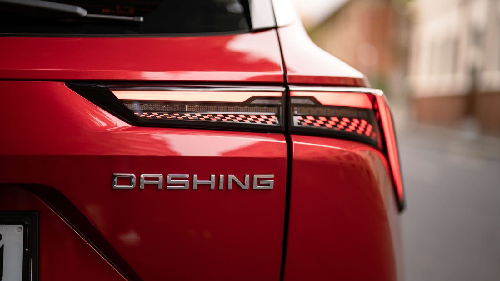 THE DYNAMIC DESIGNER BEHIND THE DASHING