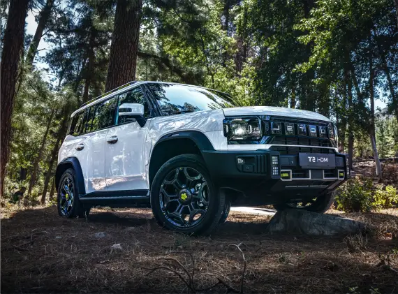 White Jetour T2 i-DM in an off-road setting